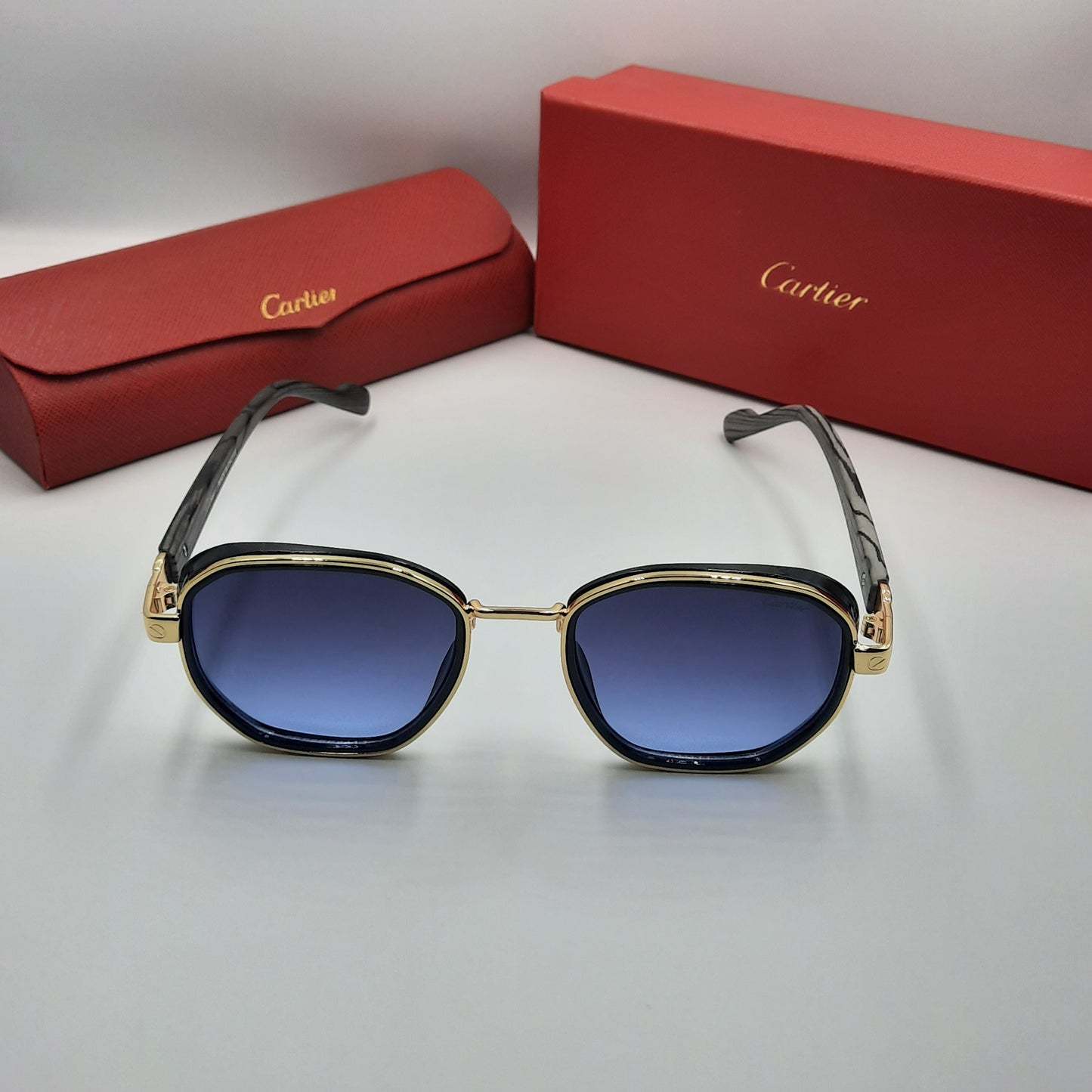 CARTIER luxe doré bleu bois