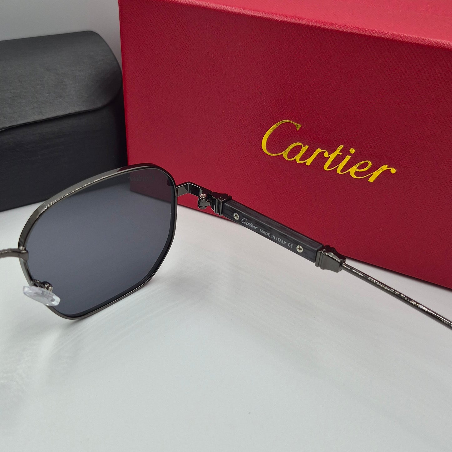 CARTIER luxe metal bois noir