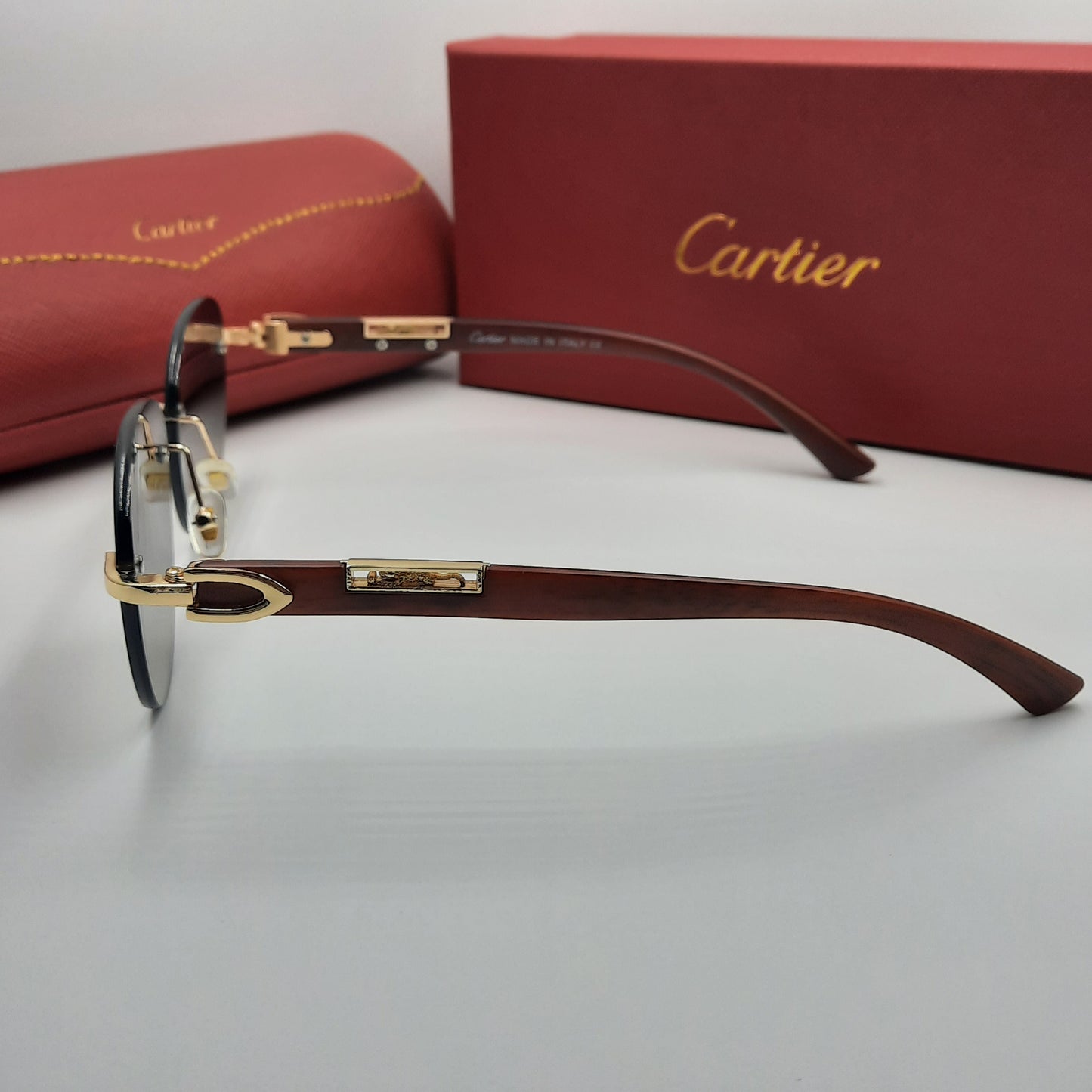 CARTIER percée doré marron
