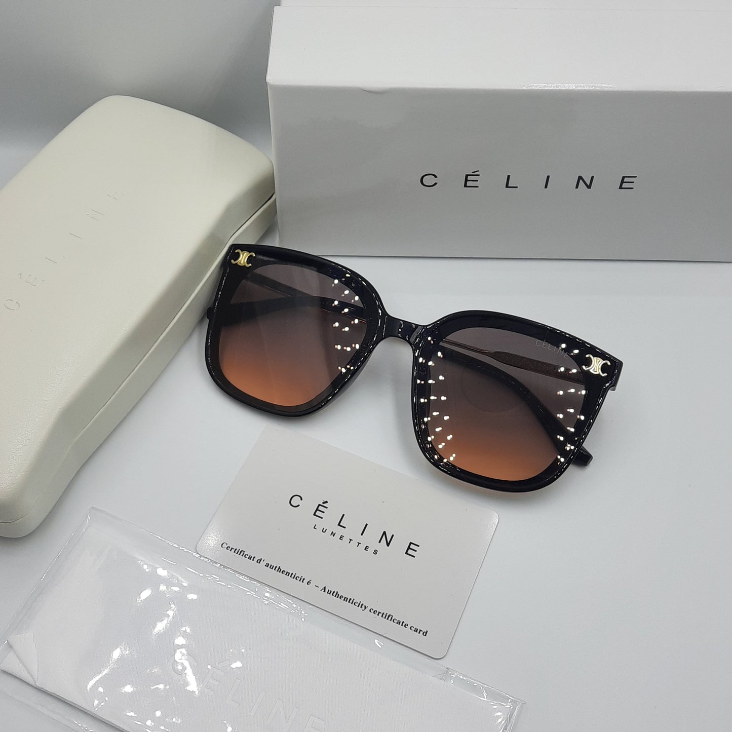 CELINE noir doré sunrise
