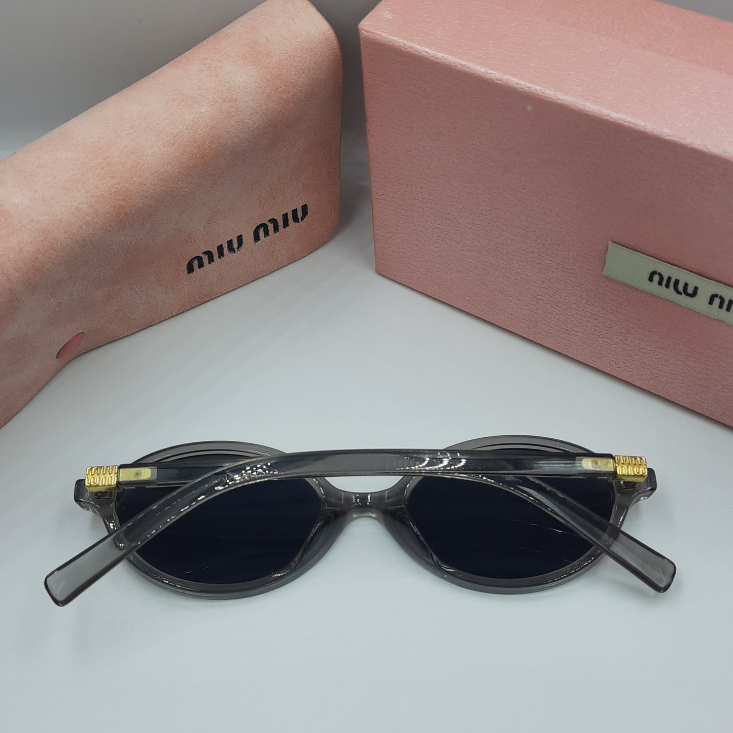 MIU MIU gris doré