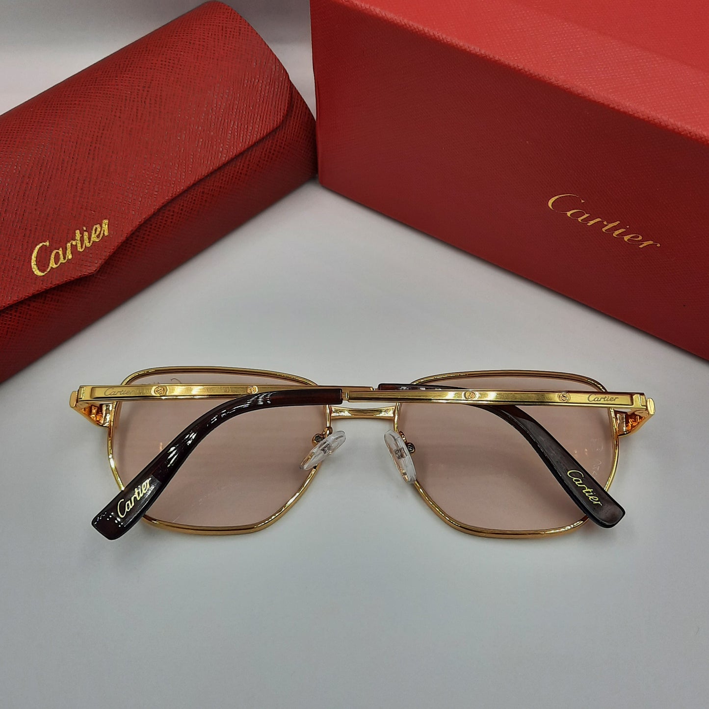 CARTIER doré metal saumon clair