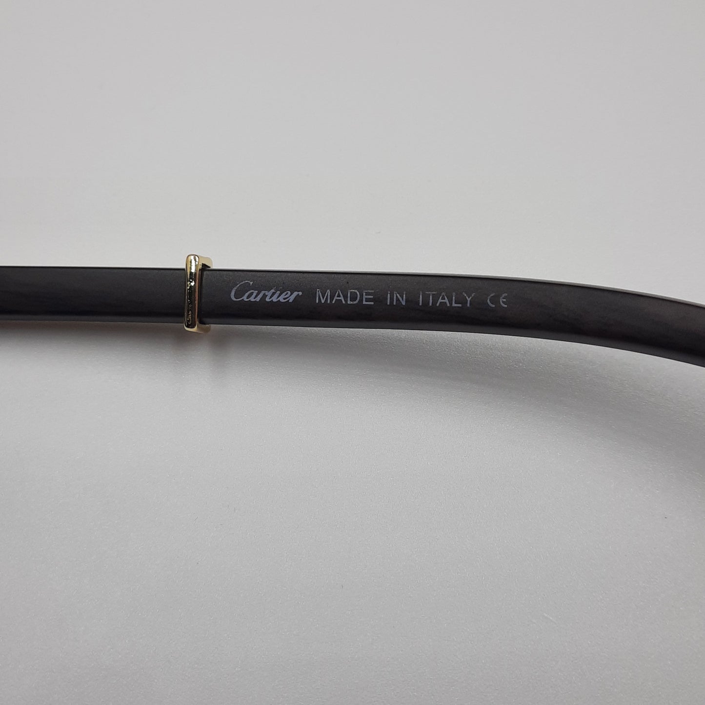 CARTIER rimless doré noir