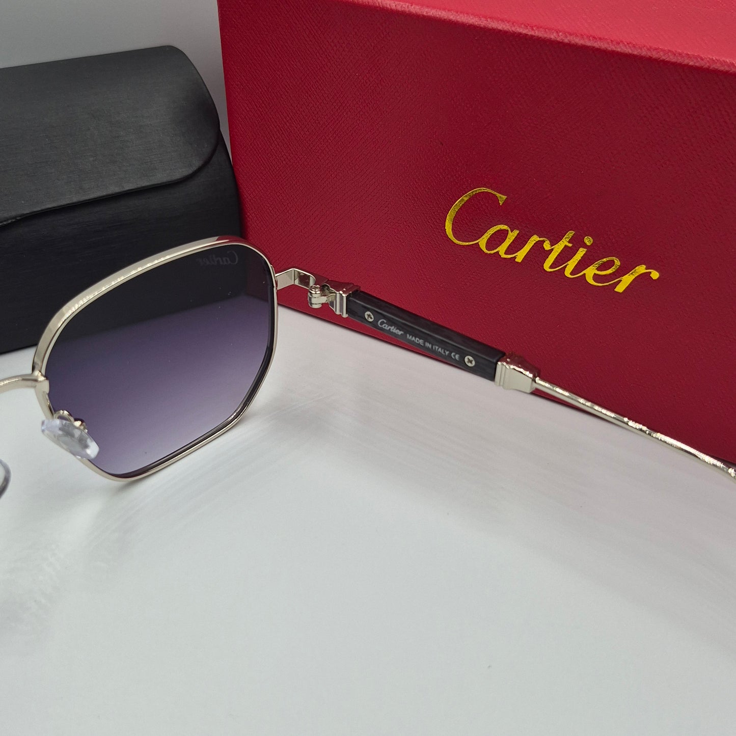 CARTIER luxe metal bois noir argent