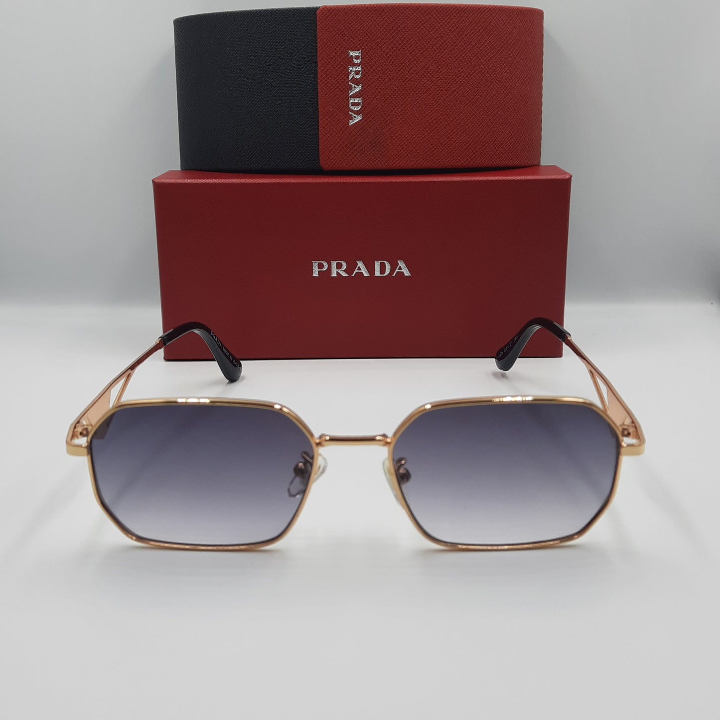 PRADA doré noir