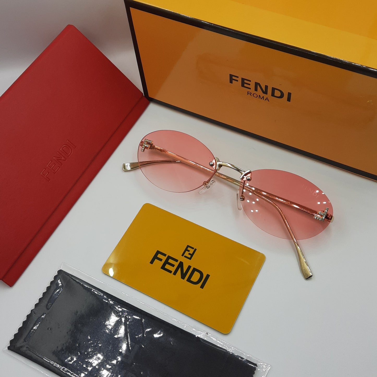 FENDI First crystal rose pink doré