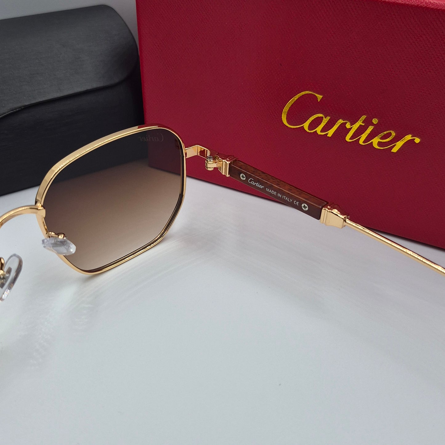 CARTIER luxe metal bois doré marron