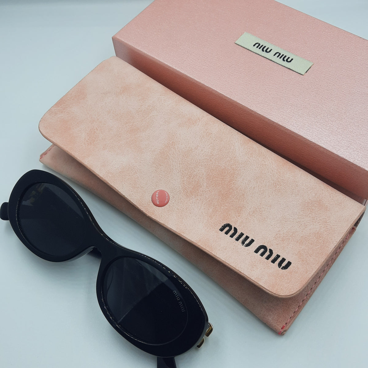 MIU MIU doré noir