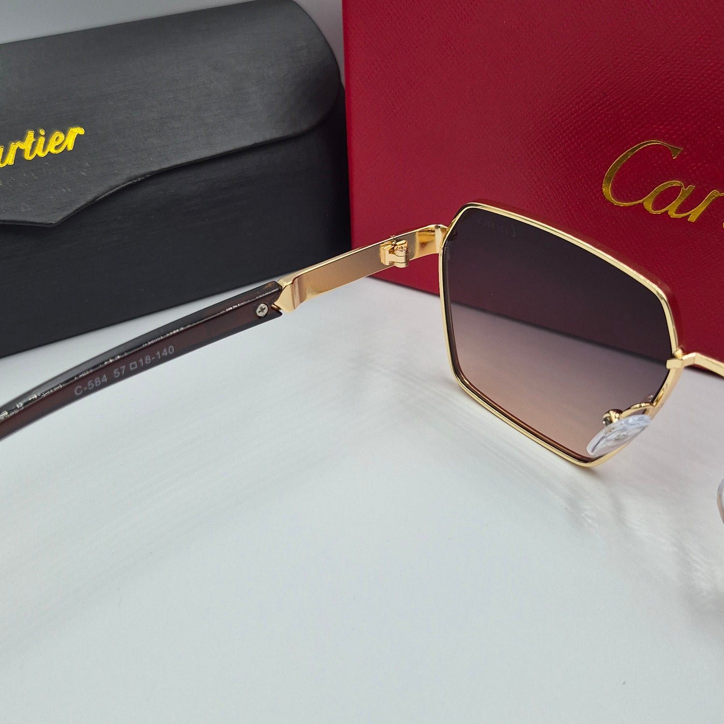 CARTIER noir doré sunset