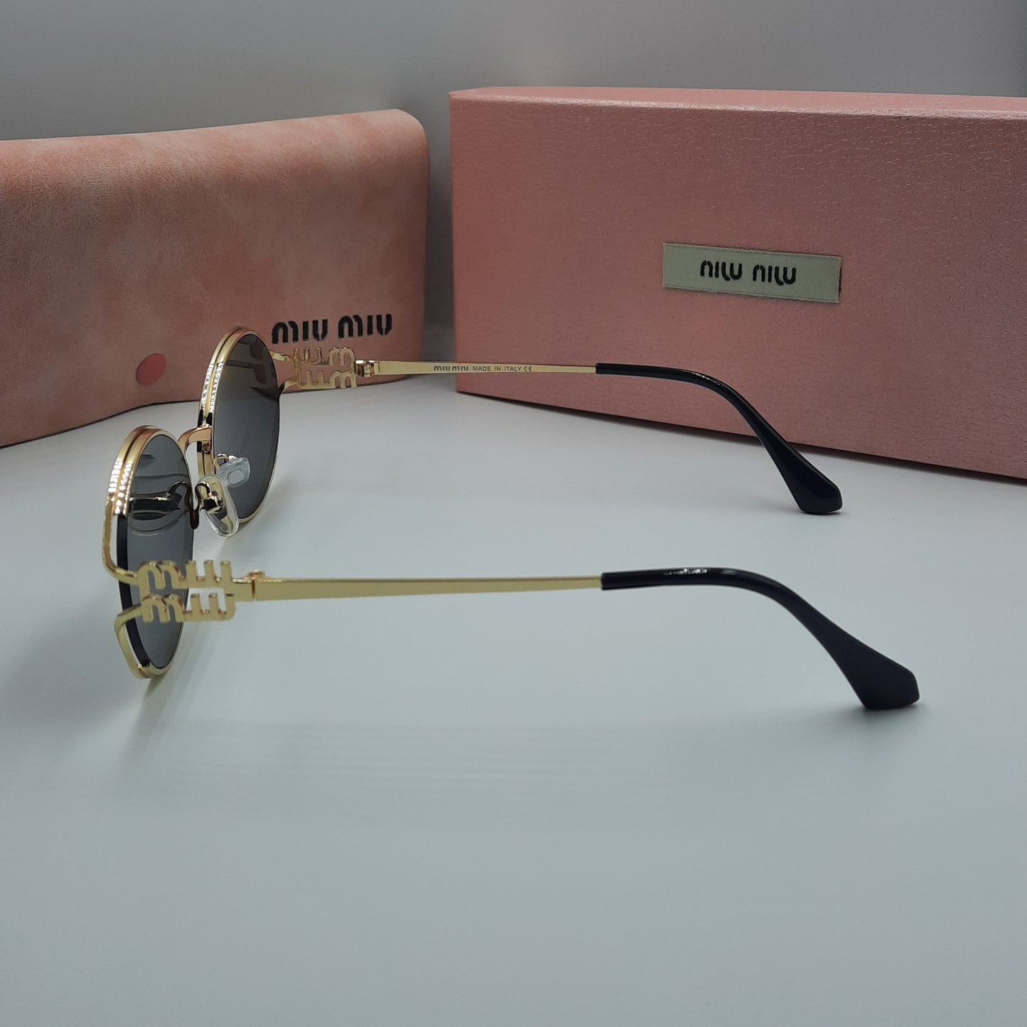 MIU MIU doré noir