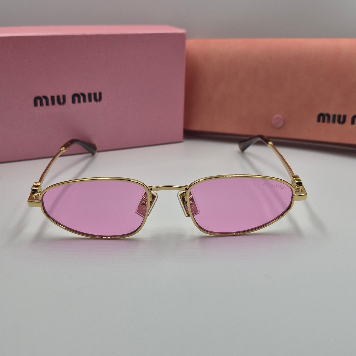 MIU MIU rose gold