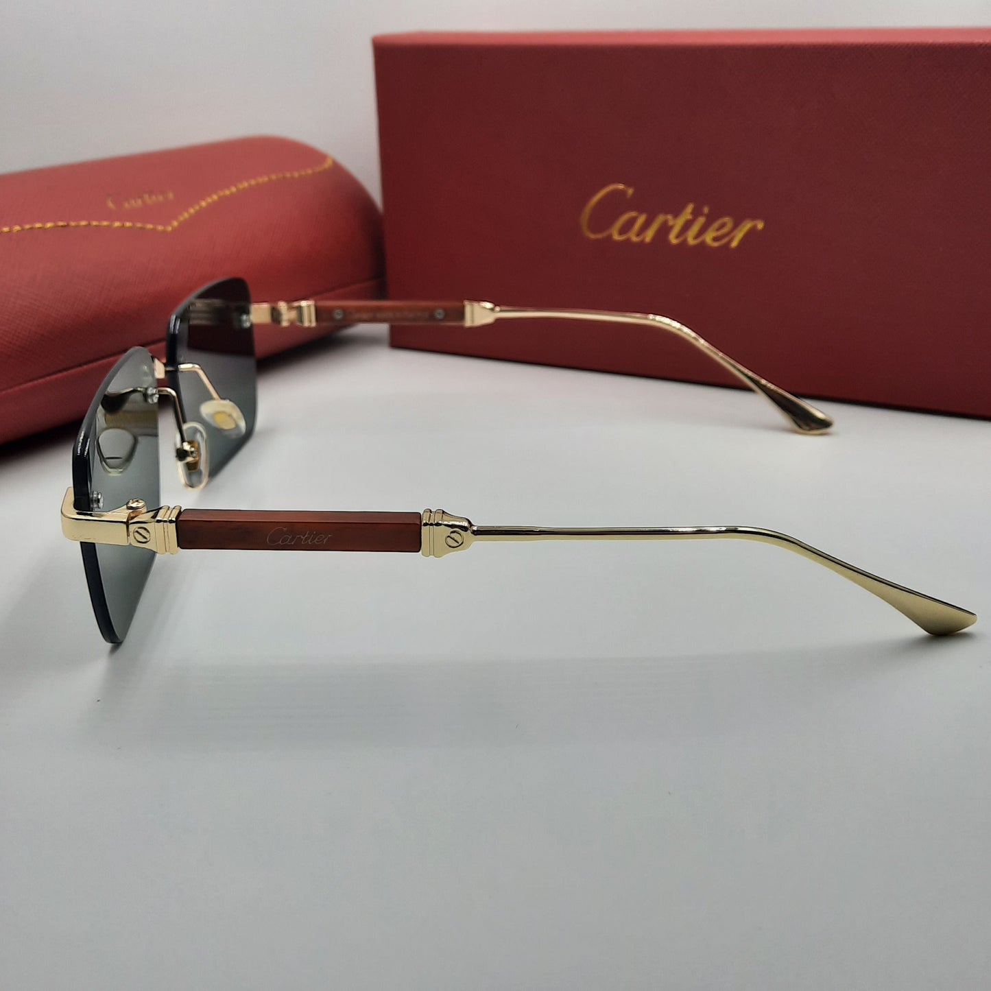 CARTIER rimless doré vert