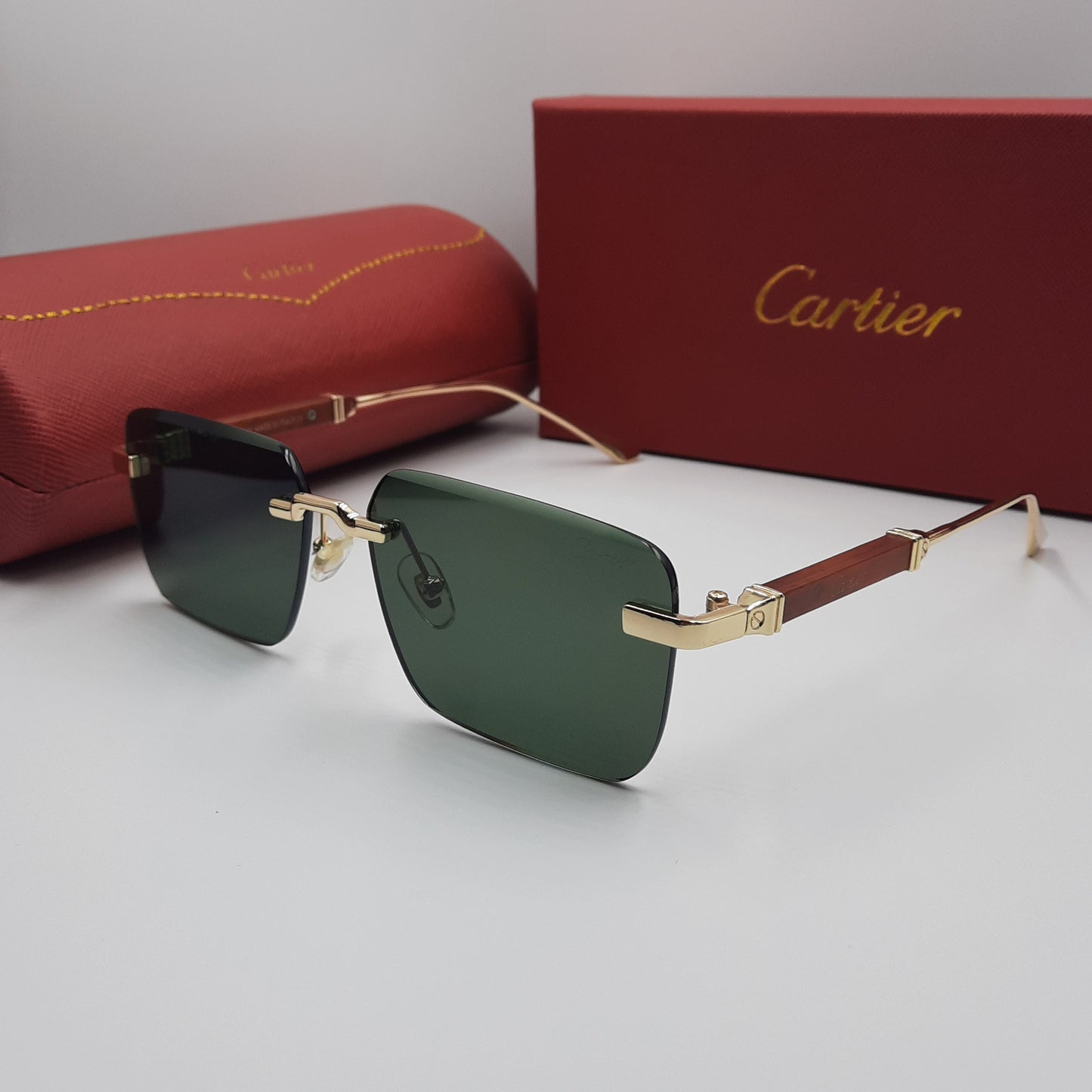 CARTIER rimless doré vert