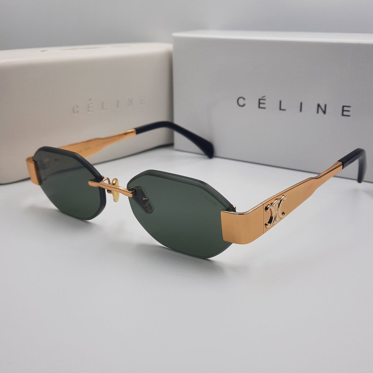 CELINE triomphe doré avec pochette à bandoulière