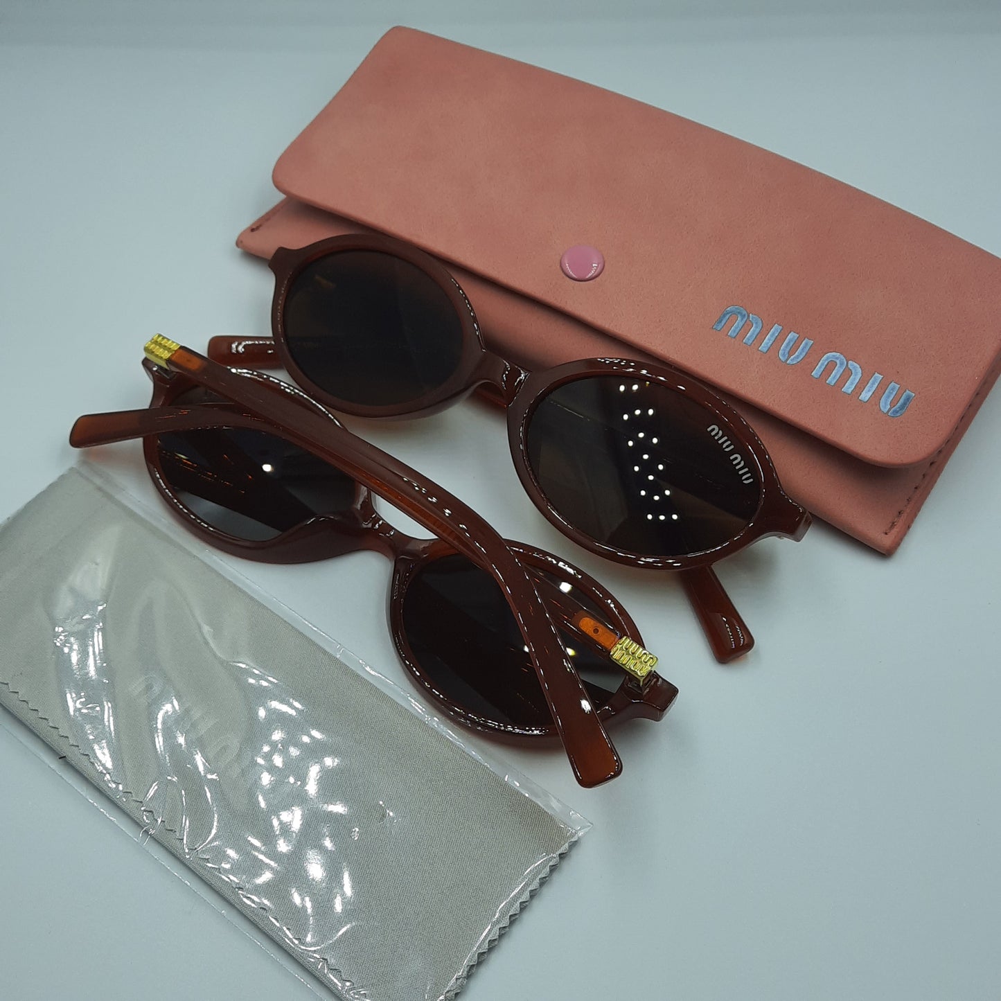 MIU MIU burgundy doré
