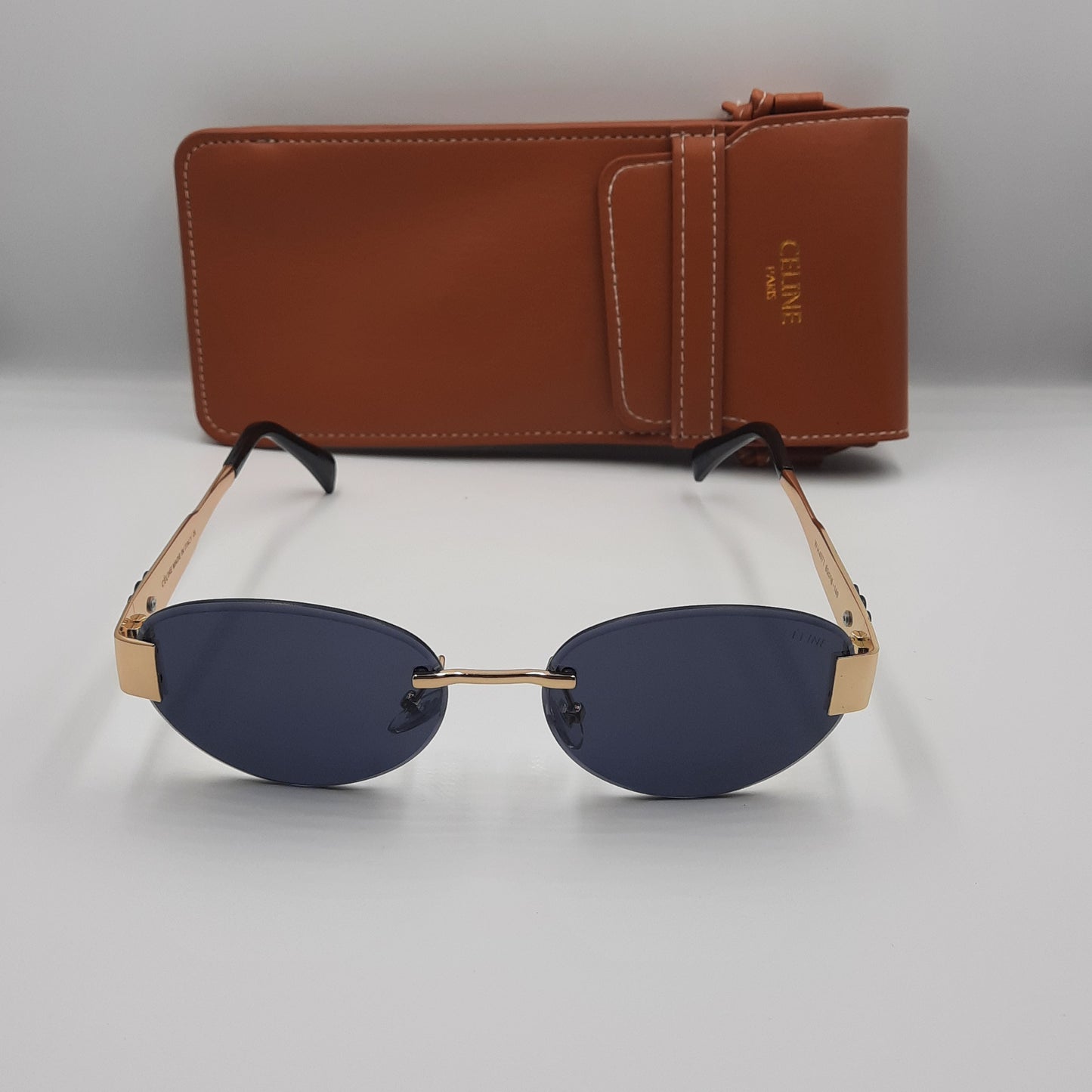 CELINE triomphe doré noir avec pochette à bandoulière