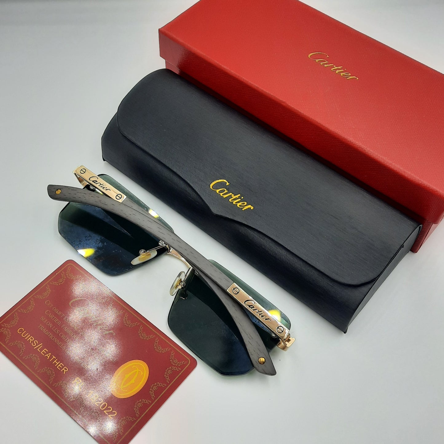 CARTIER rimless doré vert bois