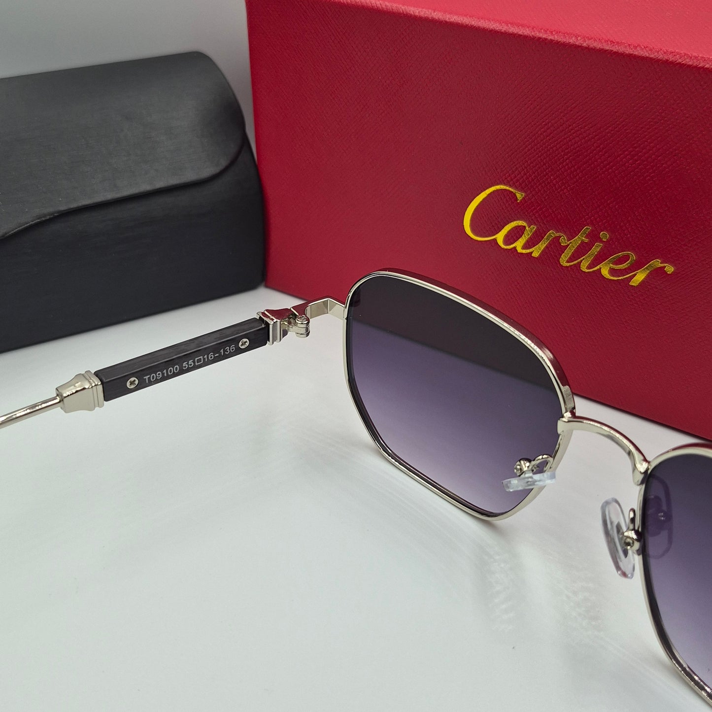 CARTIER luxe metal bois noir argent