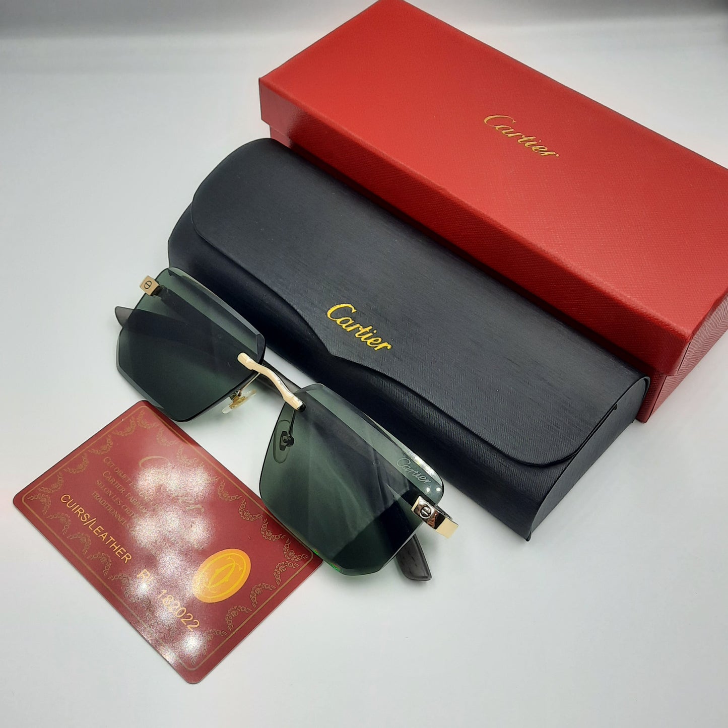 CARTIER rimless doré vert bois