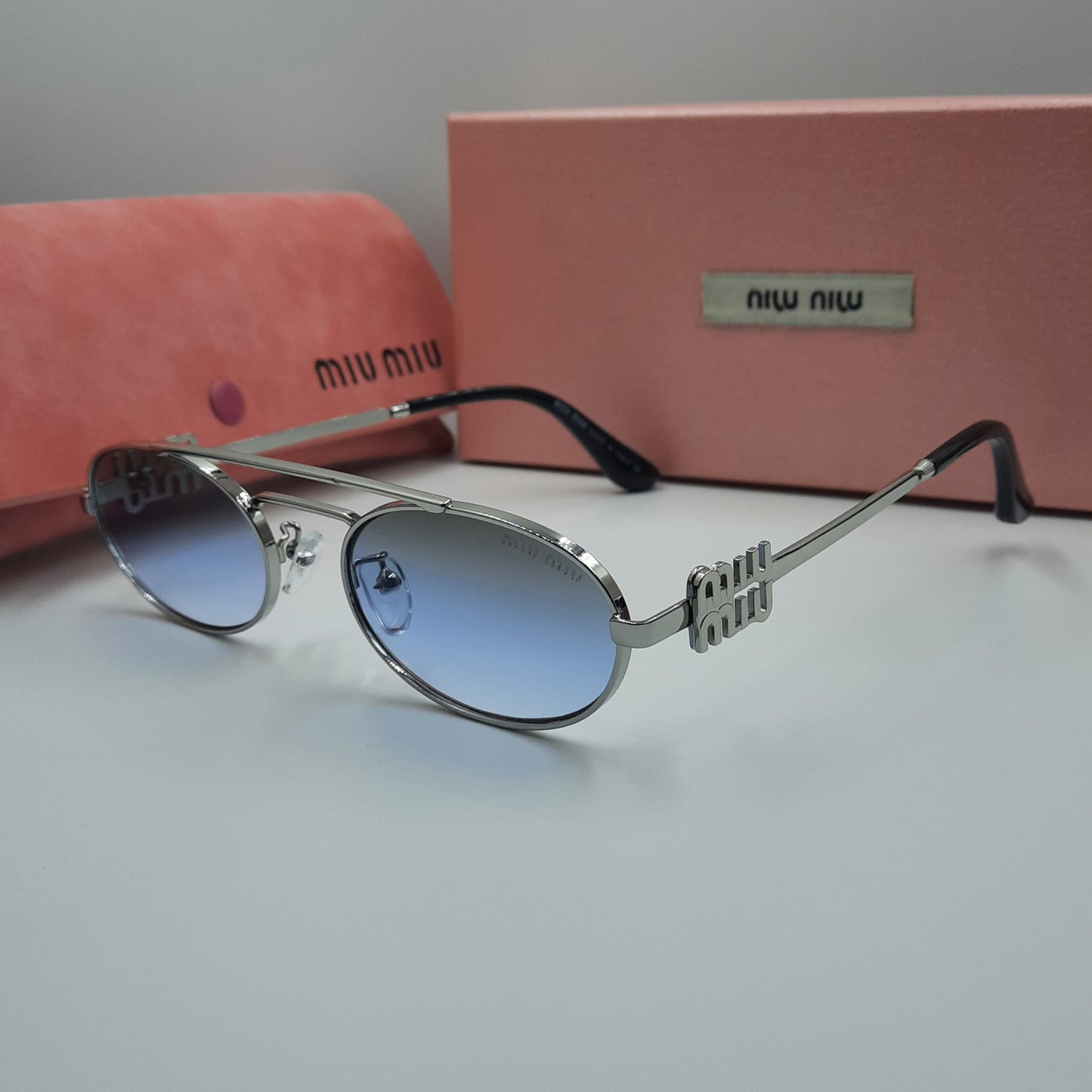 MIU MIU bleu argenté