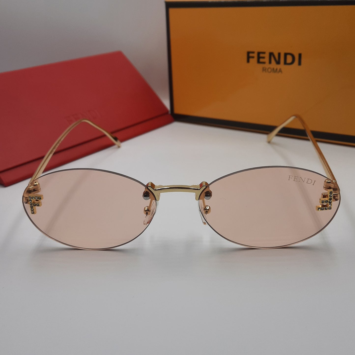FENDI First crystal rose saumon doré
