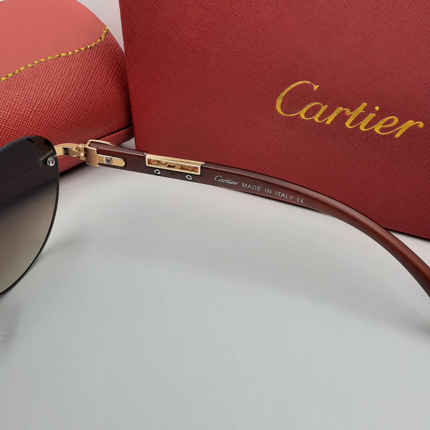 CARTIER percée doré marron