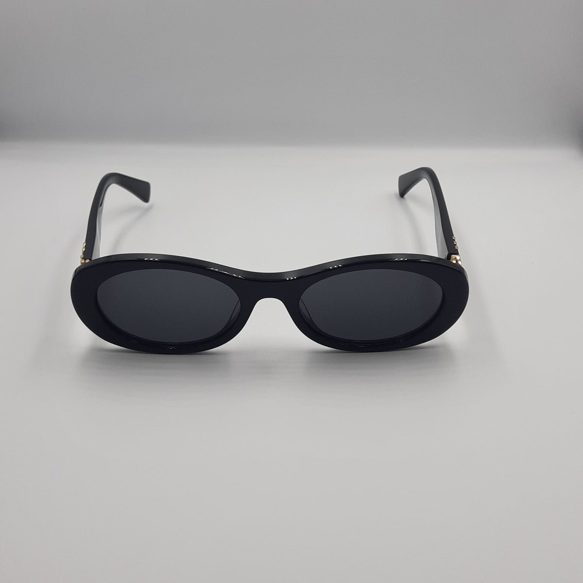 MIU MIU doré noir