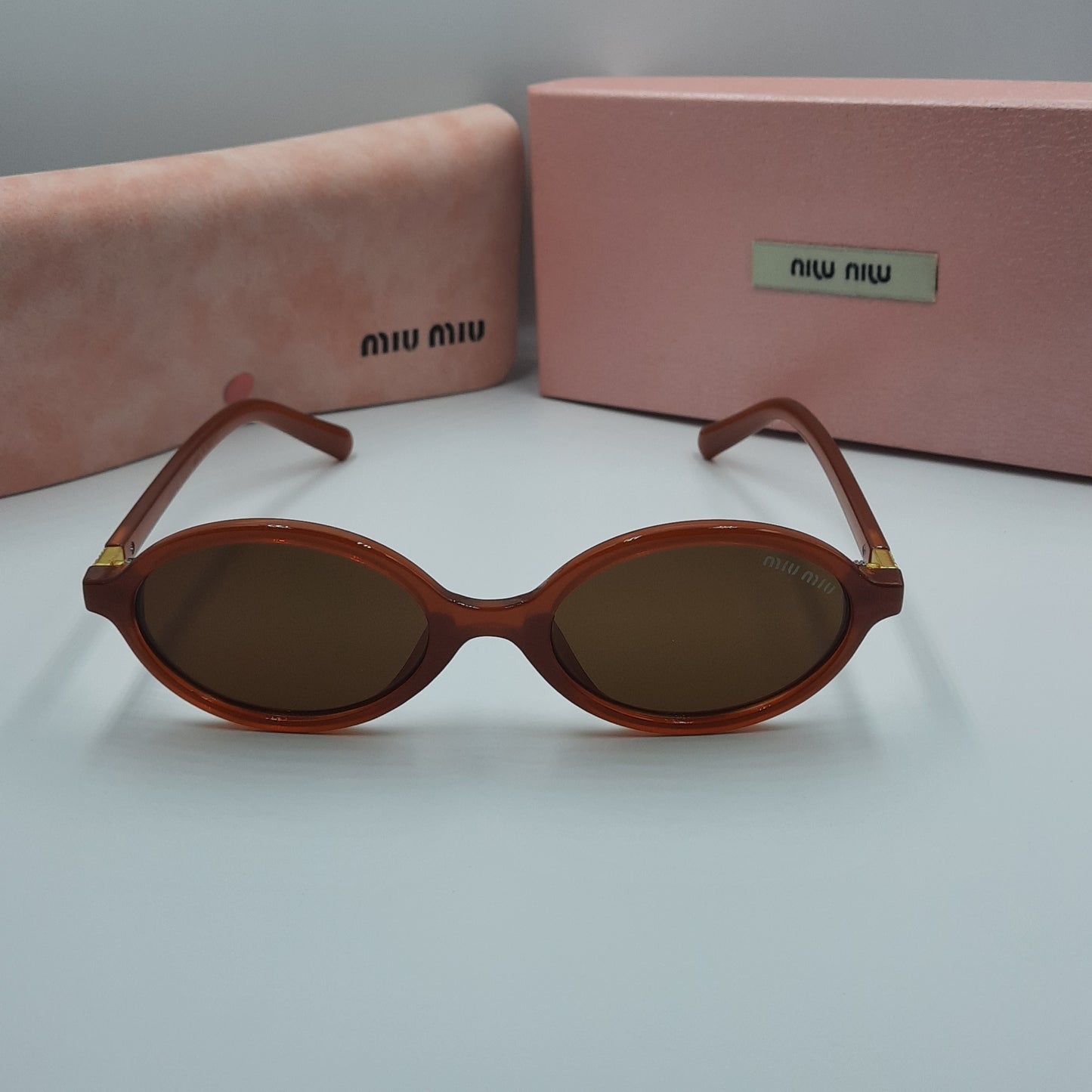 MIU MIU burgundy doré