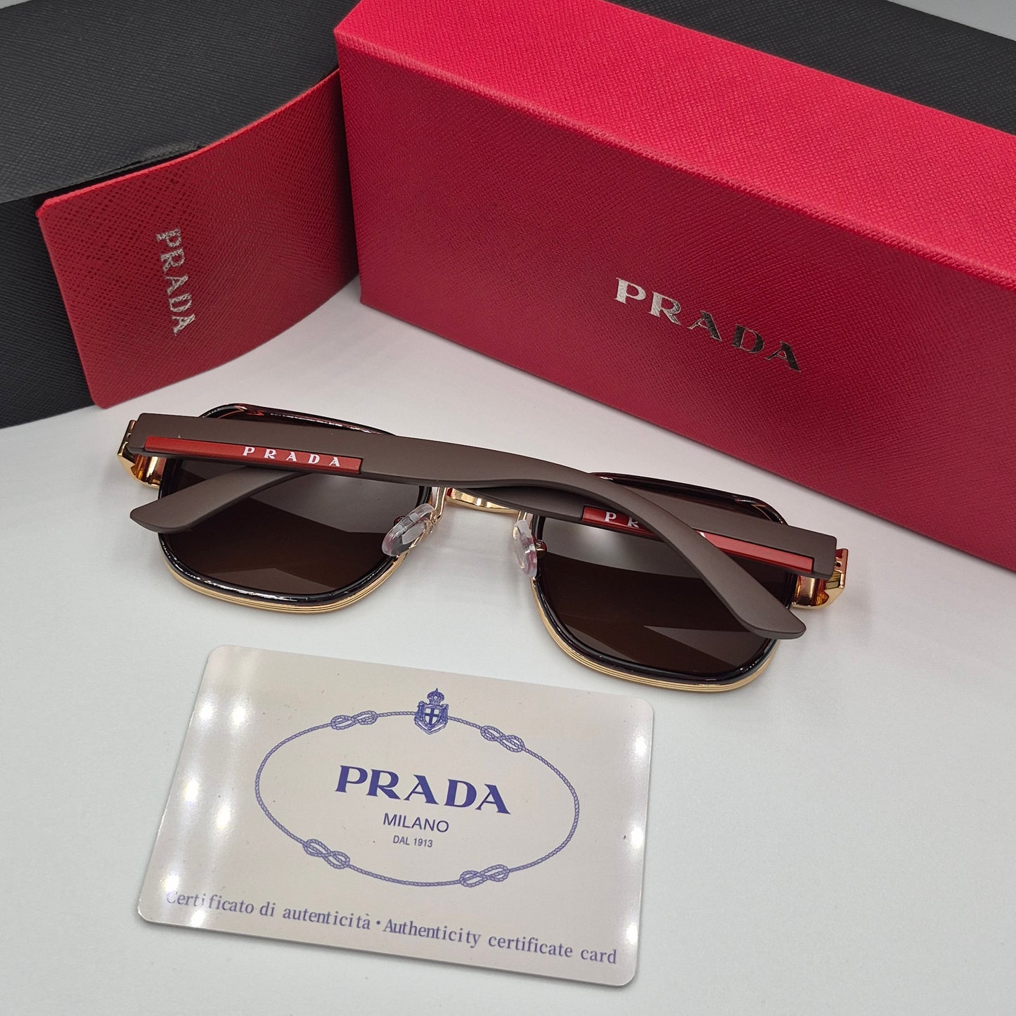 PRADA doré marron rouge flexible