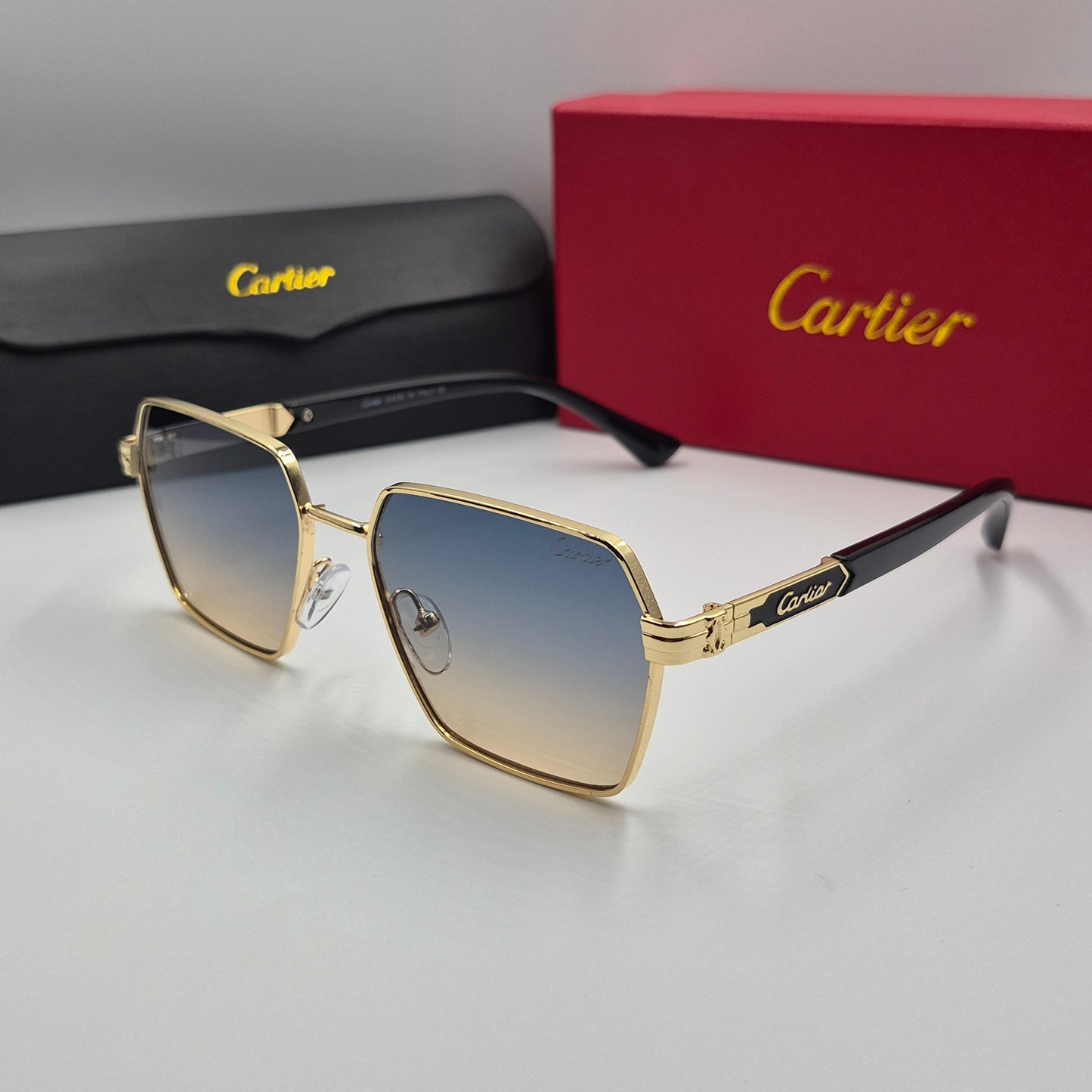 CARTIER noir doré bleu sunrise