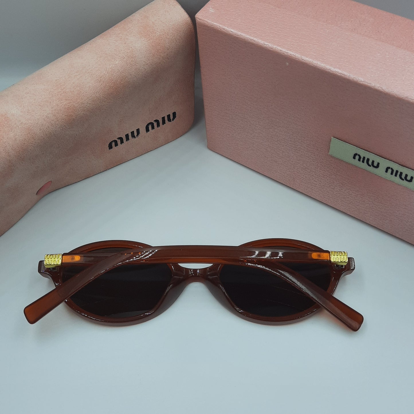 MIU MIU burgundy doré