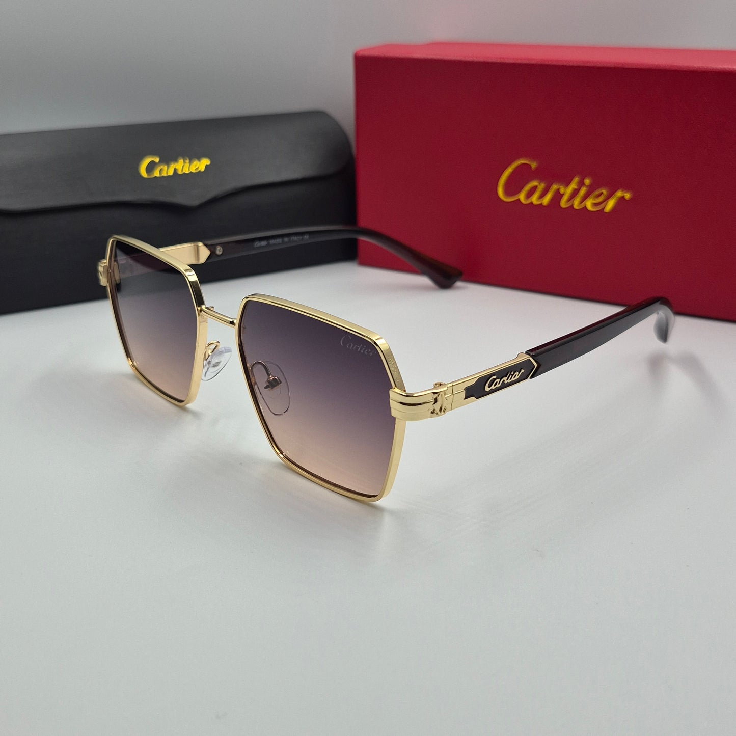 CARTIER noir doré sunset