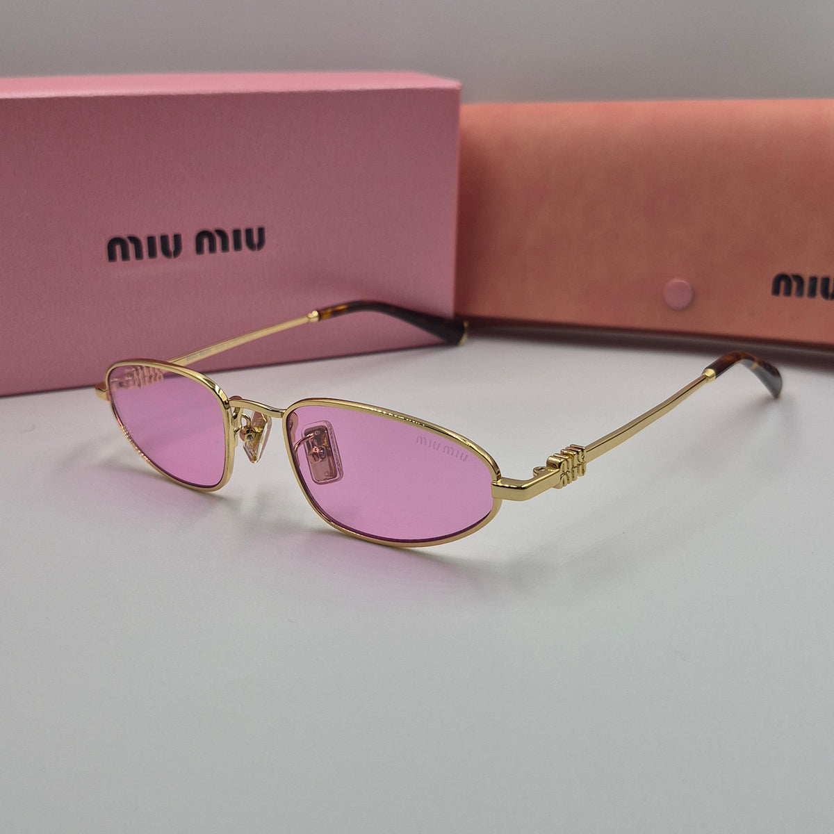MIU MIU rose gold
