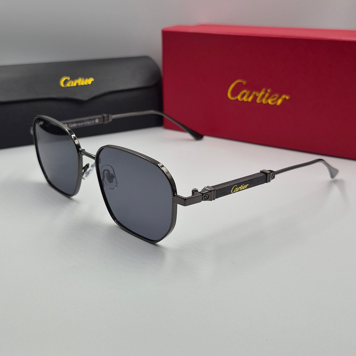 CARTIER luxe metal bois noir