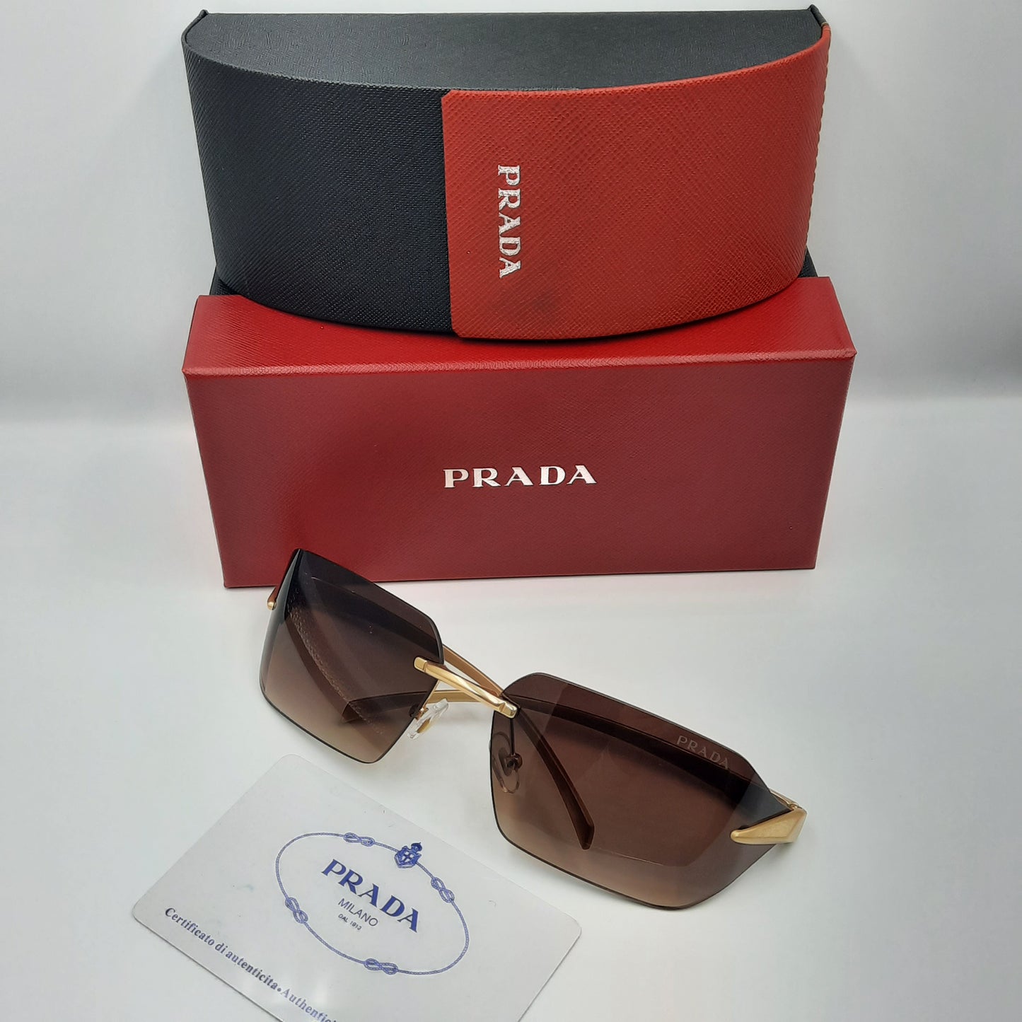 PRADA rimless doré marron