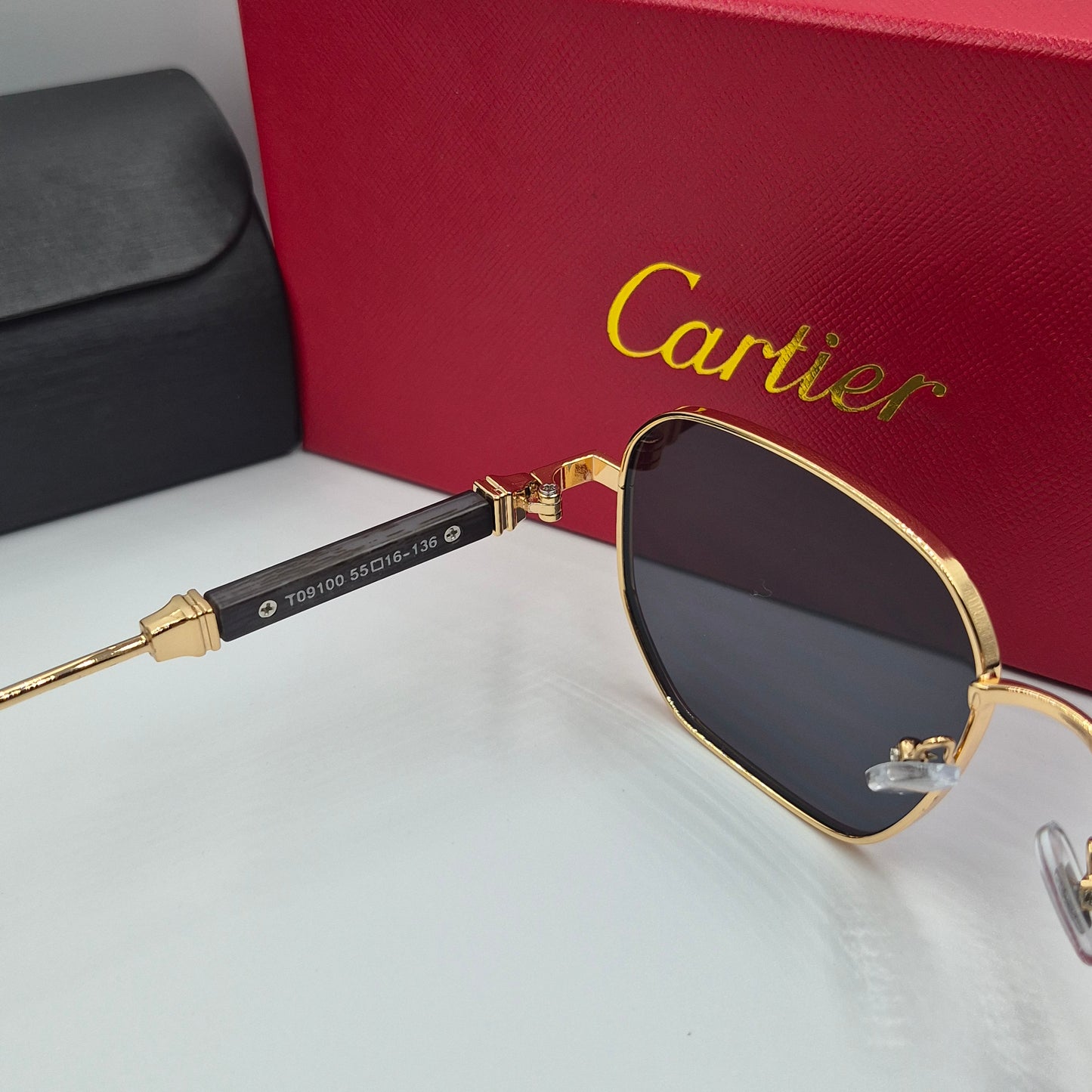CARTIER luxe metal bois noir doré