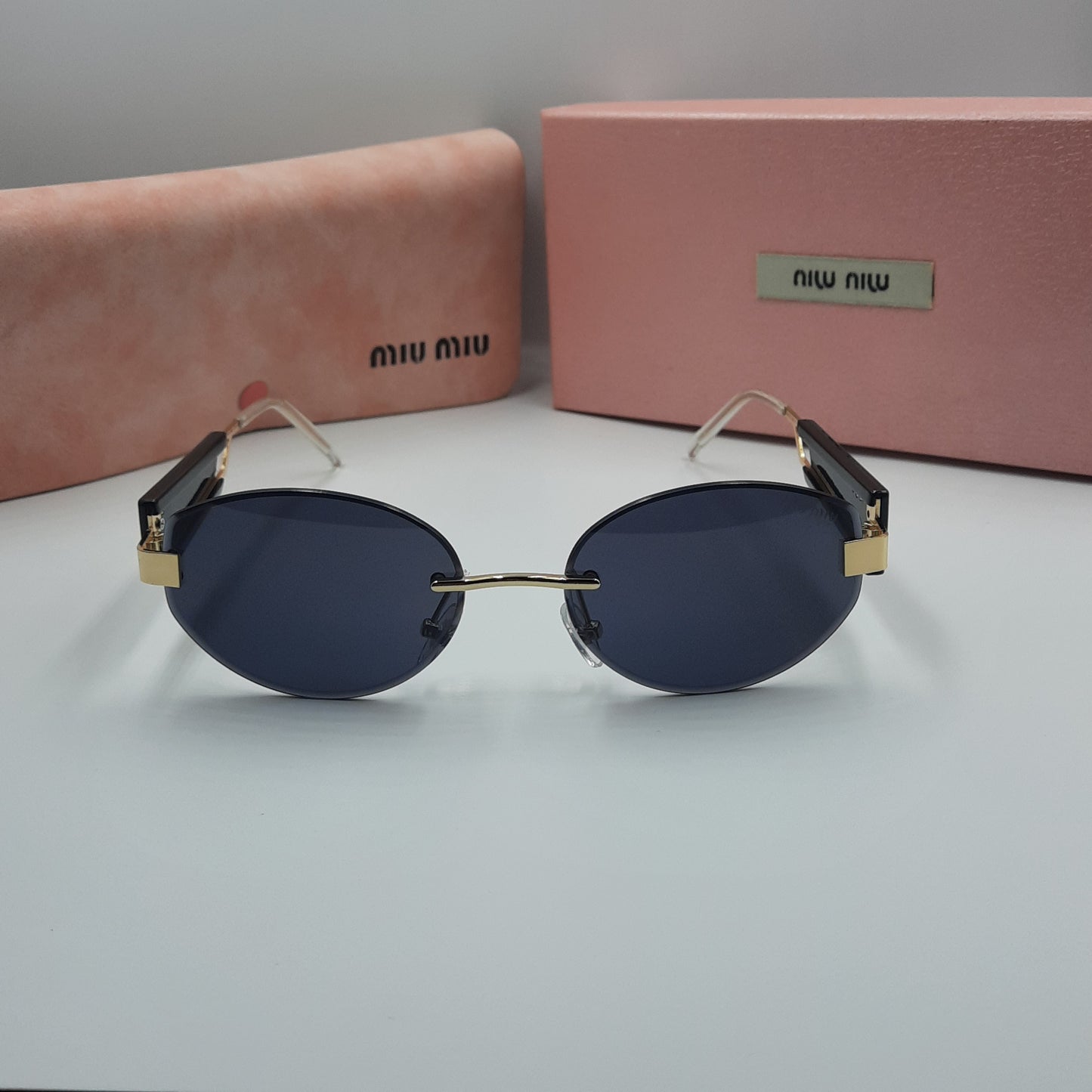 MIU MIU doré noir
