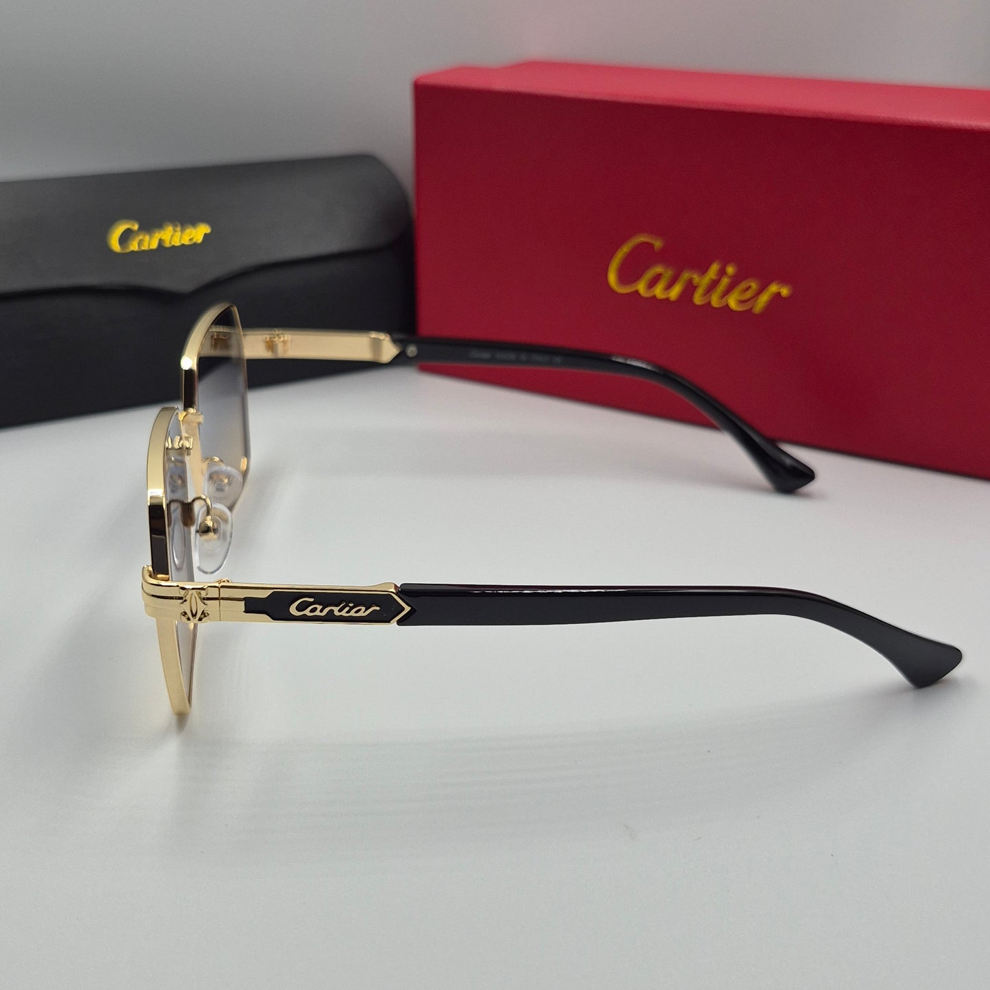 CARTIER noir doré bleu sunrise