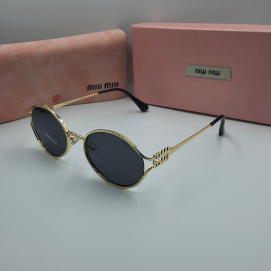 MIU MIU doré noir