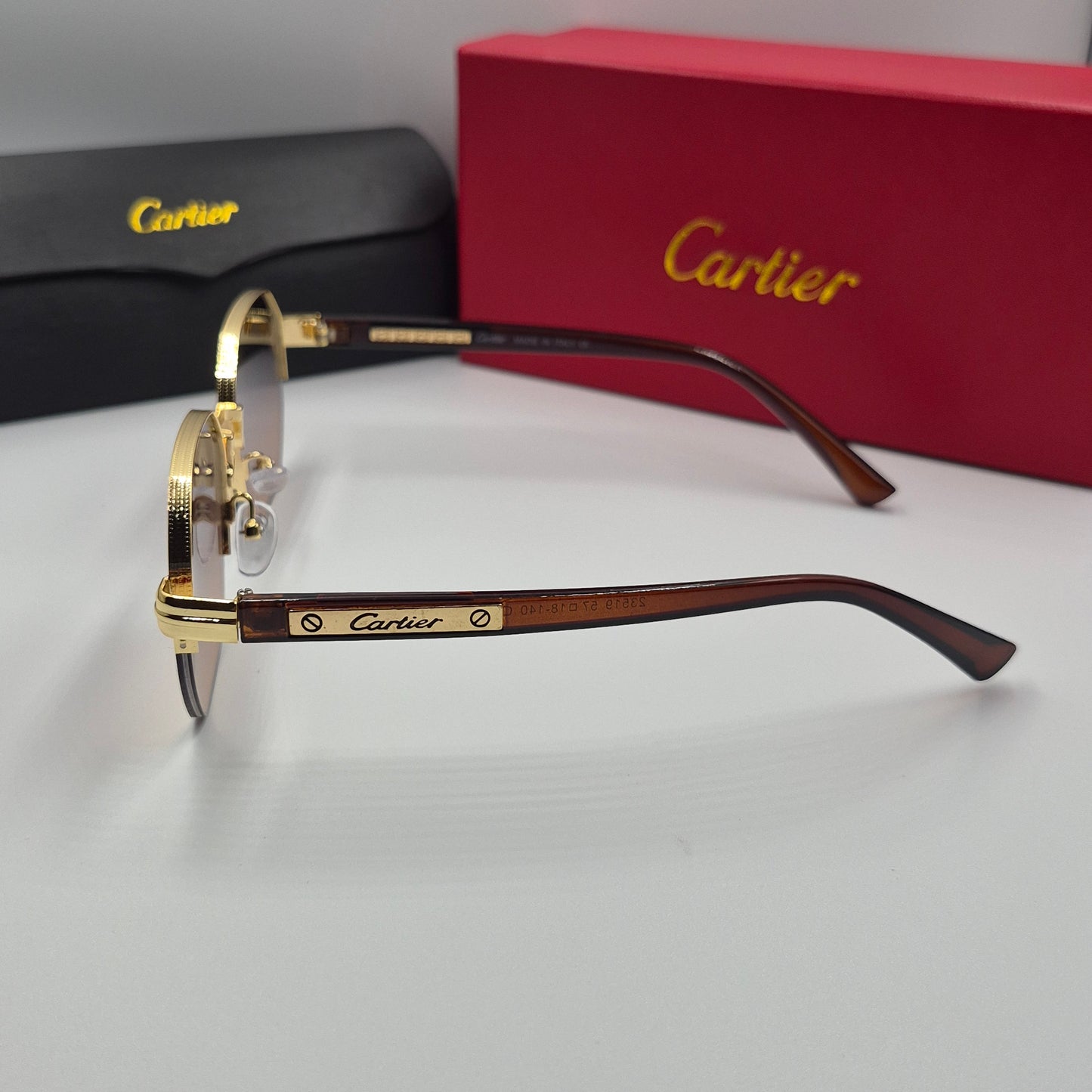 CARTIER semi percée doré marron