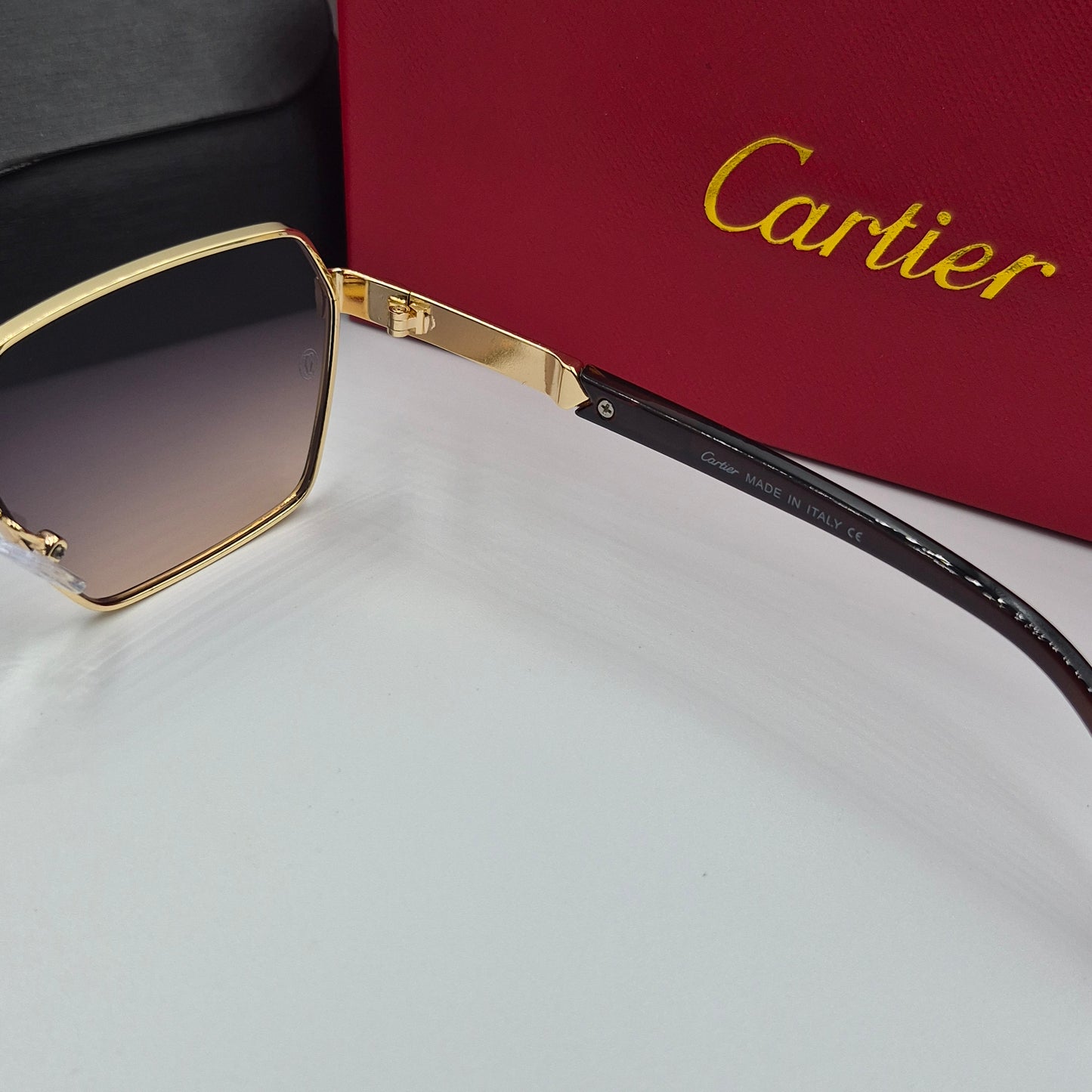 CARTIER noir doré sunset