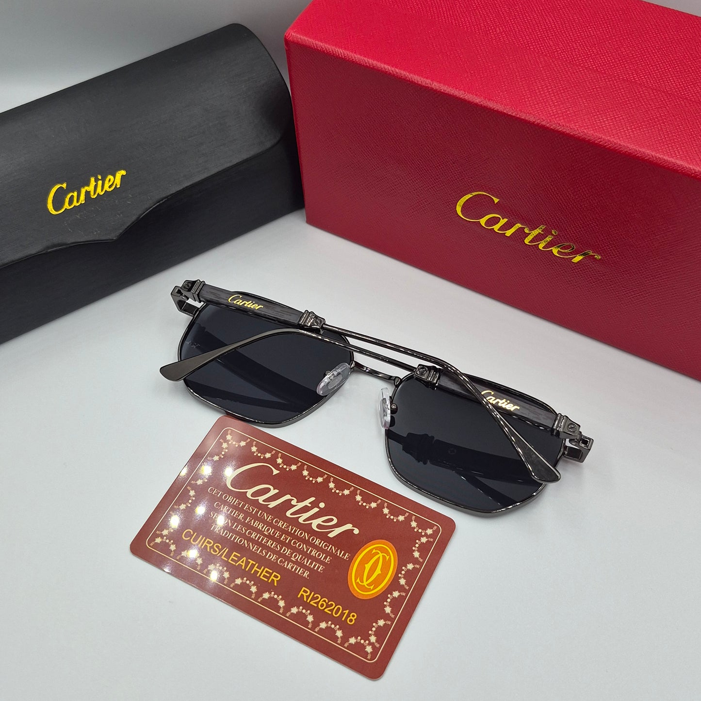 CARTIER luxe metal bois noir