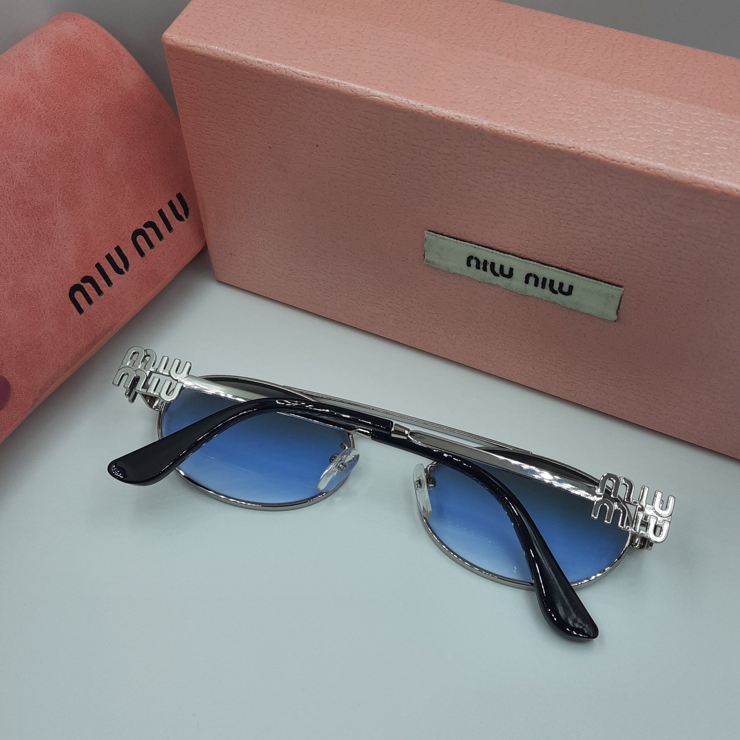 MIU MIU bleu argenté