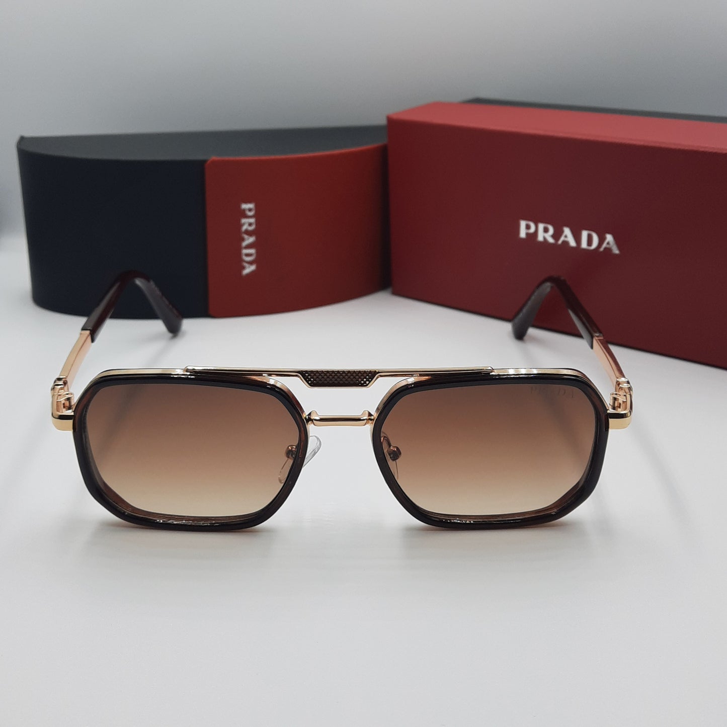PRADA doré marron