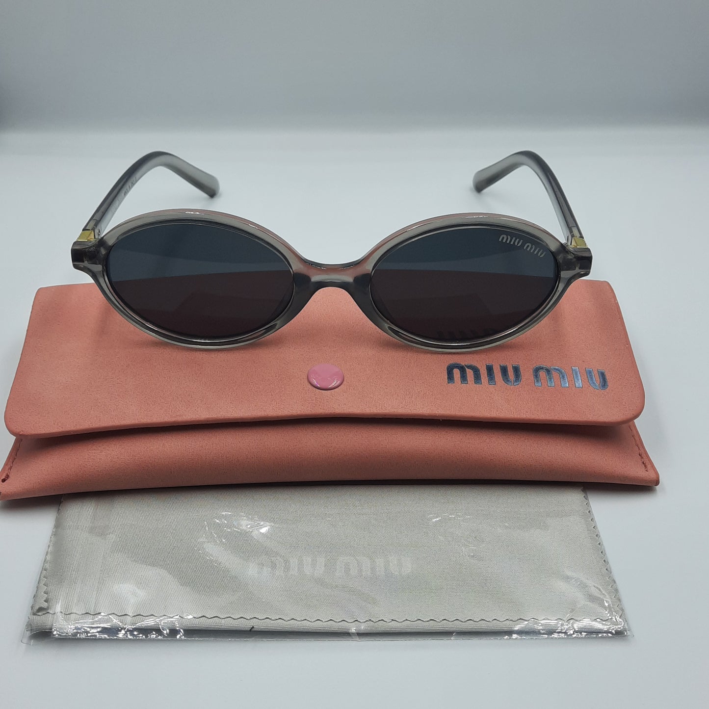 MIU MIU gris doré
