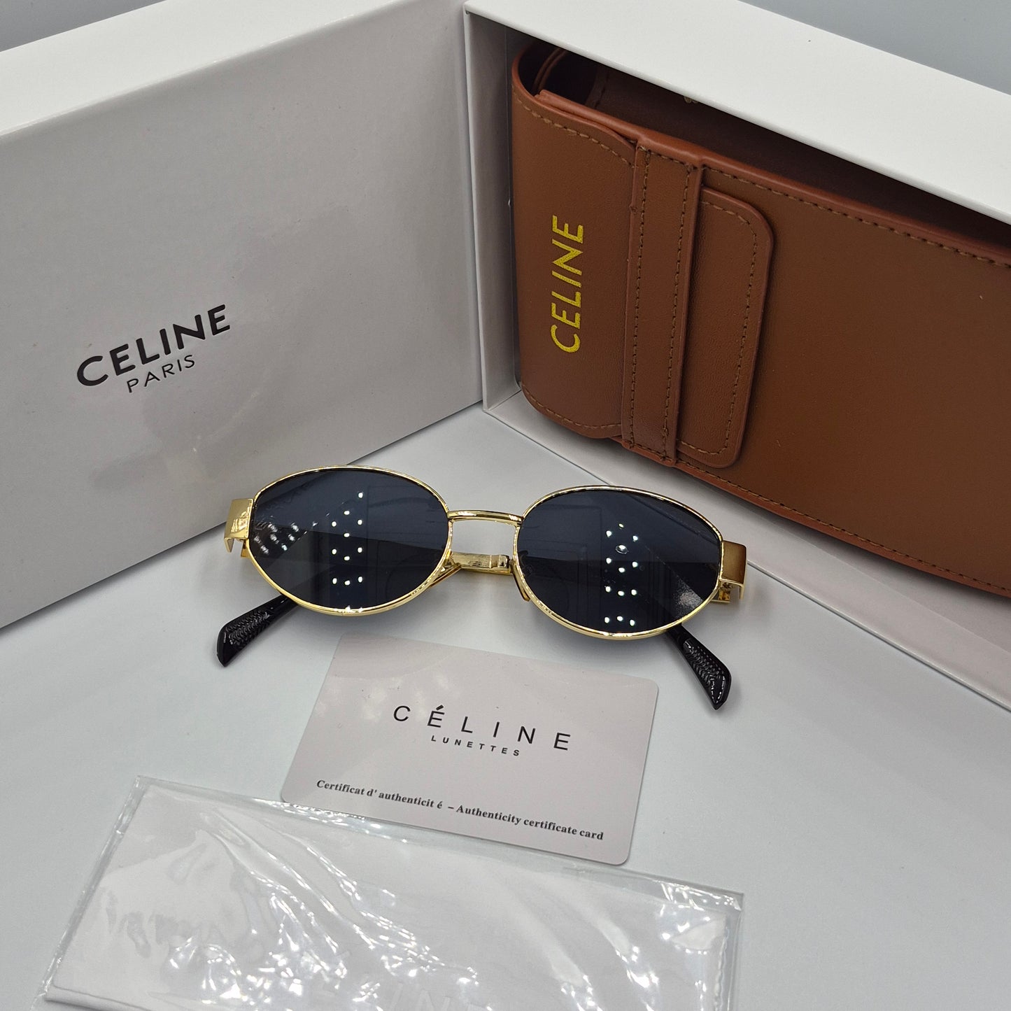 CELINE triomphe doré noir