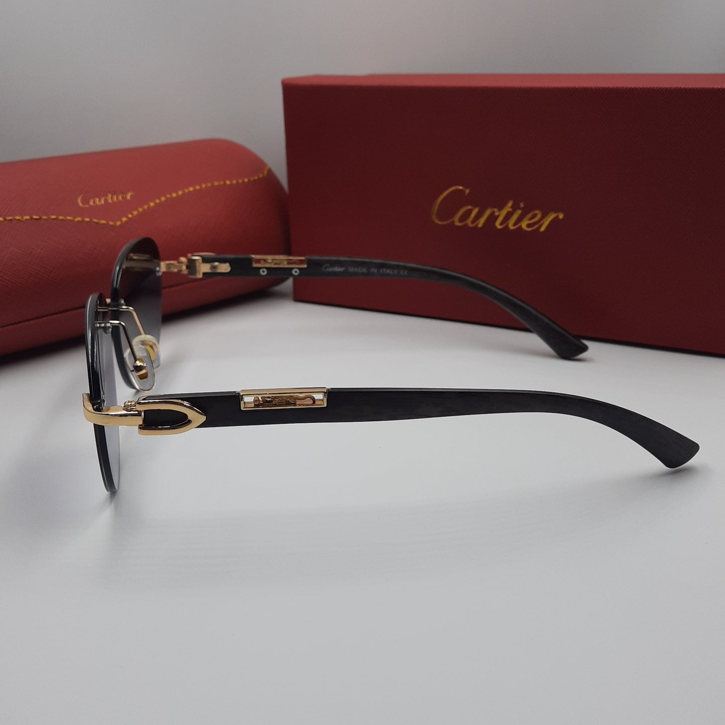 CARTIER percée doré noir wood