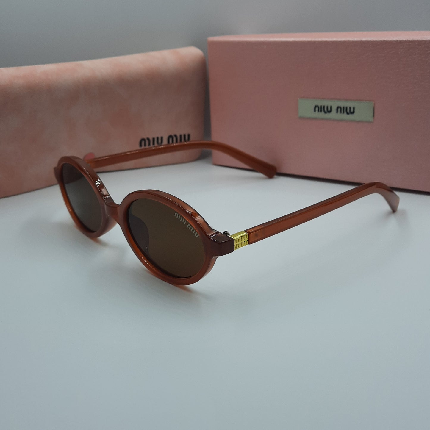 MIU MIU burgundy doré