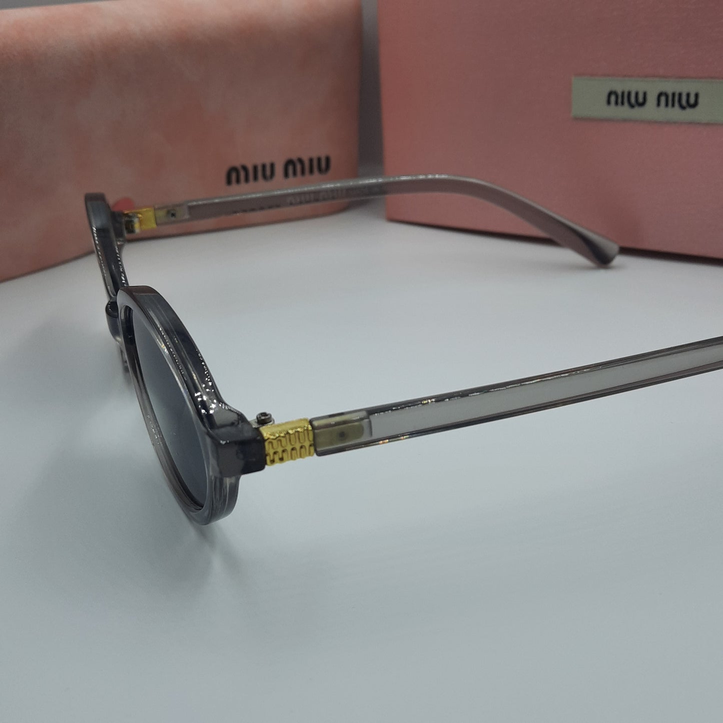MIU MIU gris doré