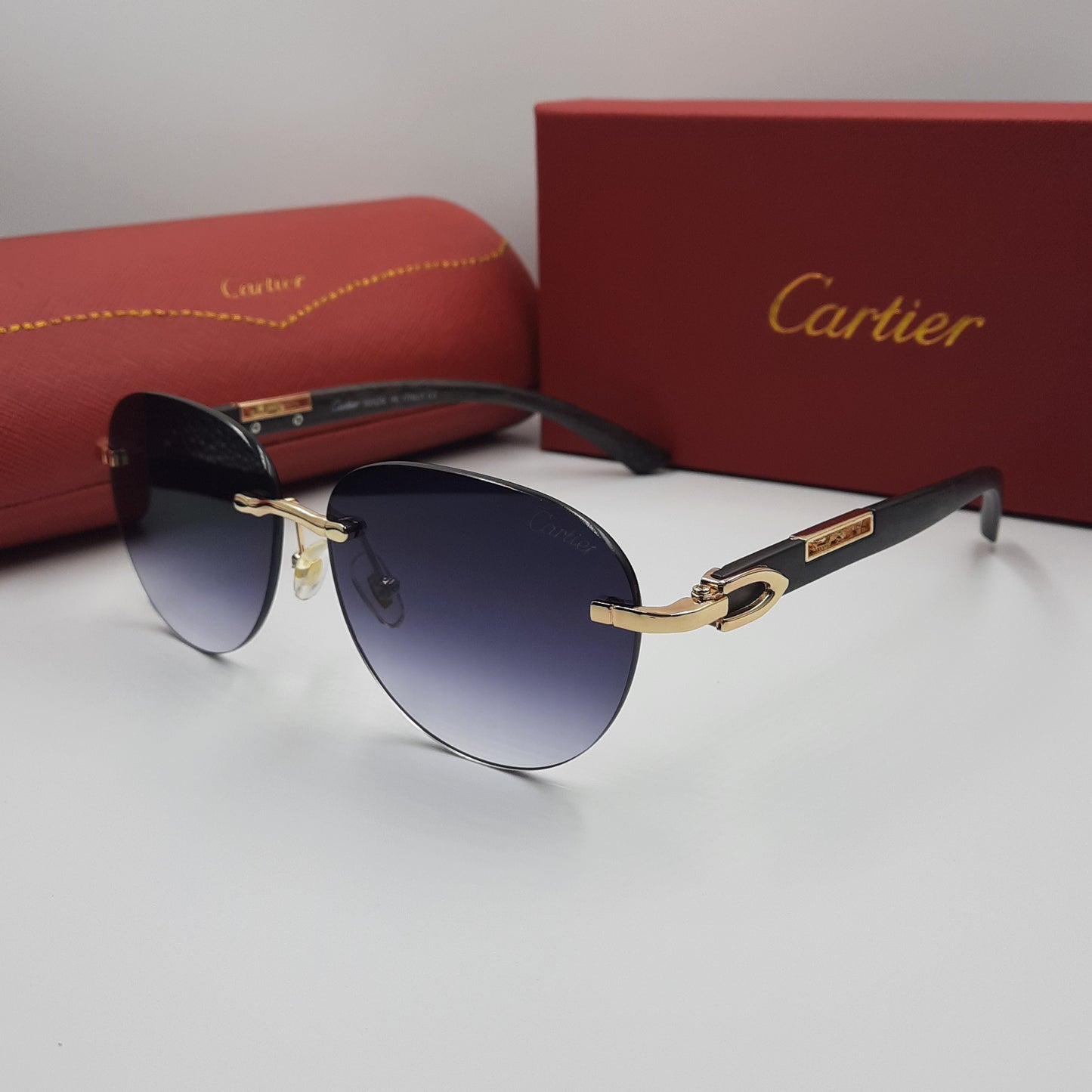 CARTIER percée doré noir wood
